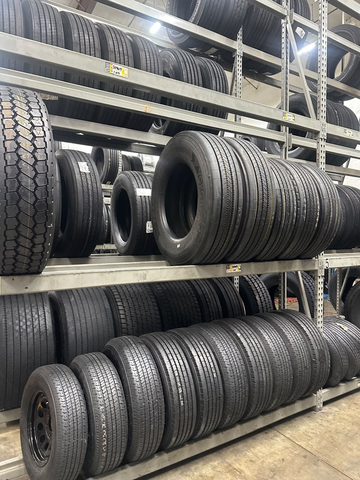 Warehouse stock of commercial truck tires at Punjab Truck Care and Roadside